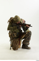  Photos John Hopkins Army Postapocalyptic Suit Poses aiming the gun kneeling whole body 0008.jpg